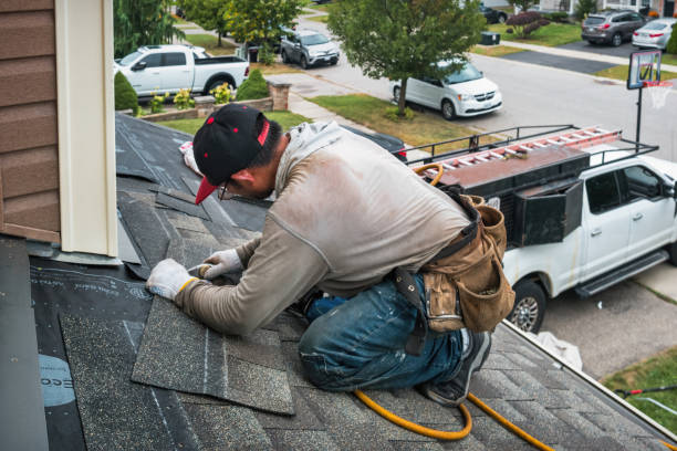 Professional Roofing technician working in Mangum, OK